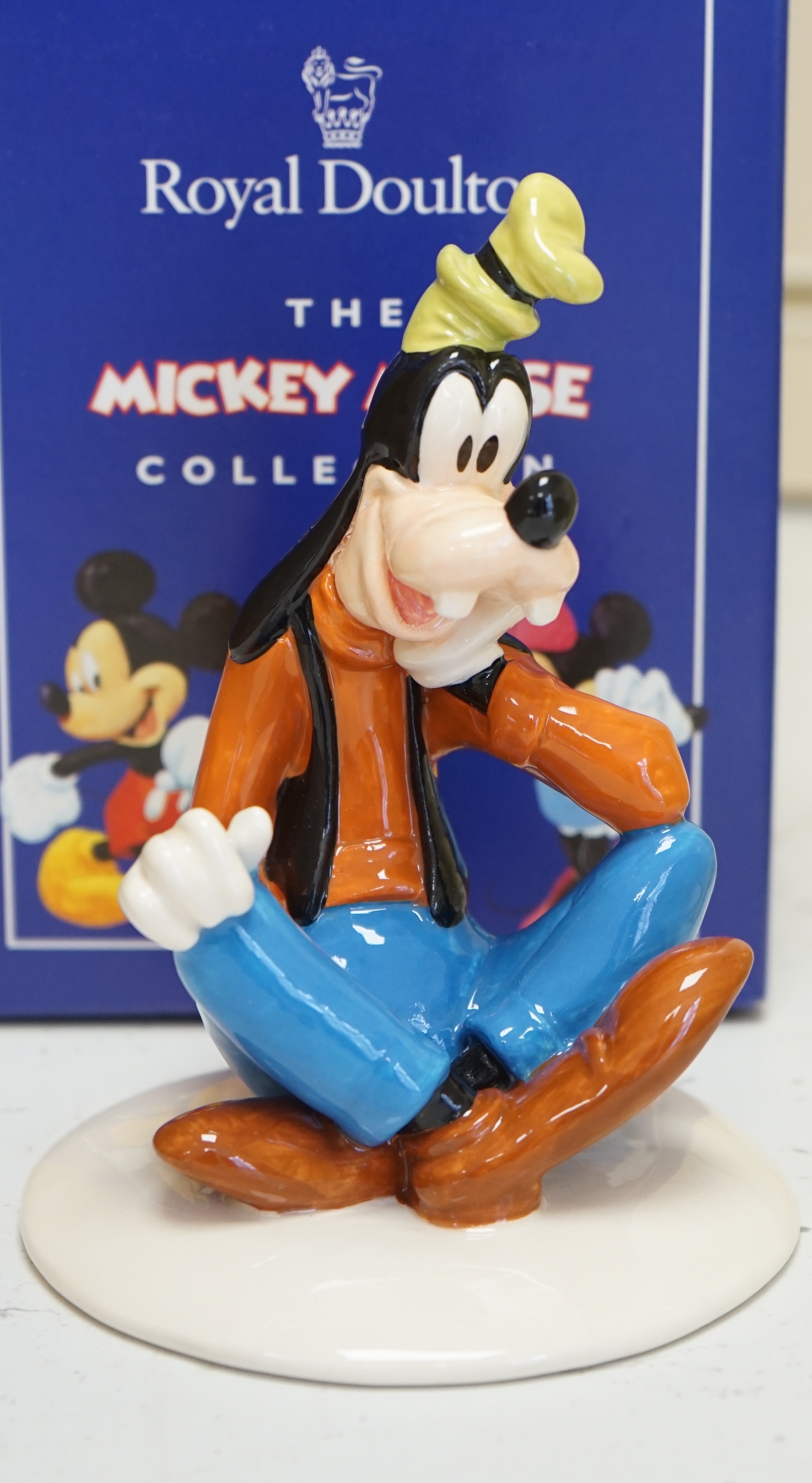Twelve Royal Doulton Mickey Mouse Collection porcelain figures to include Mickey 70th Anniversary, Minnie and Goofy, boxed. Condition - good